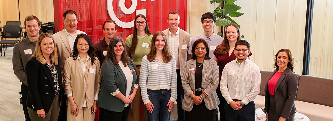 A group of people smiling for a photo